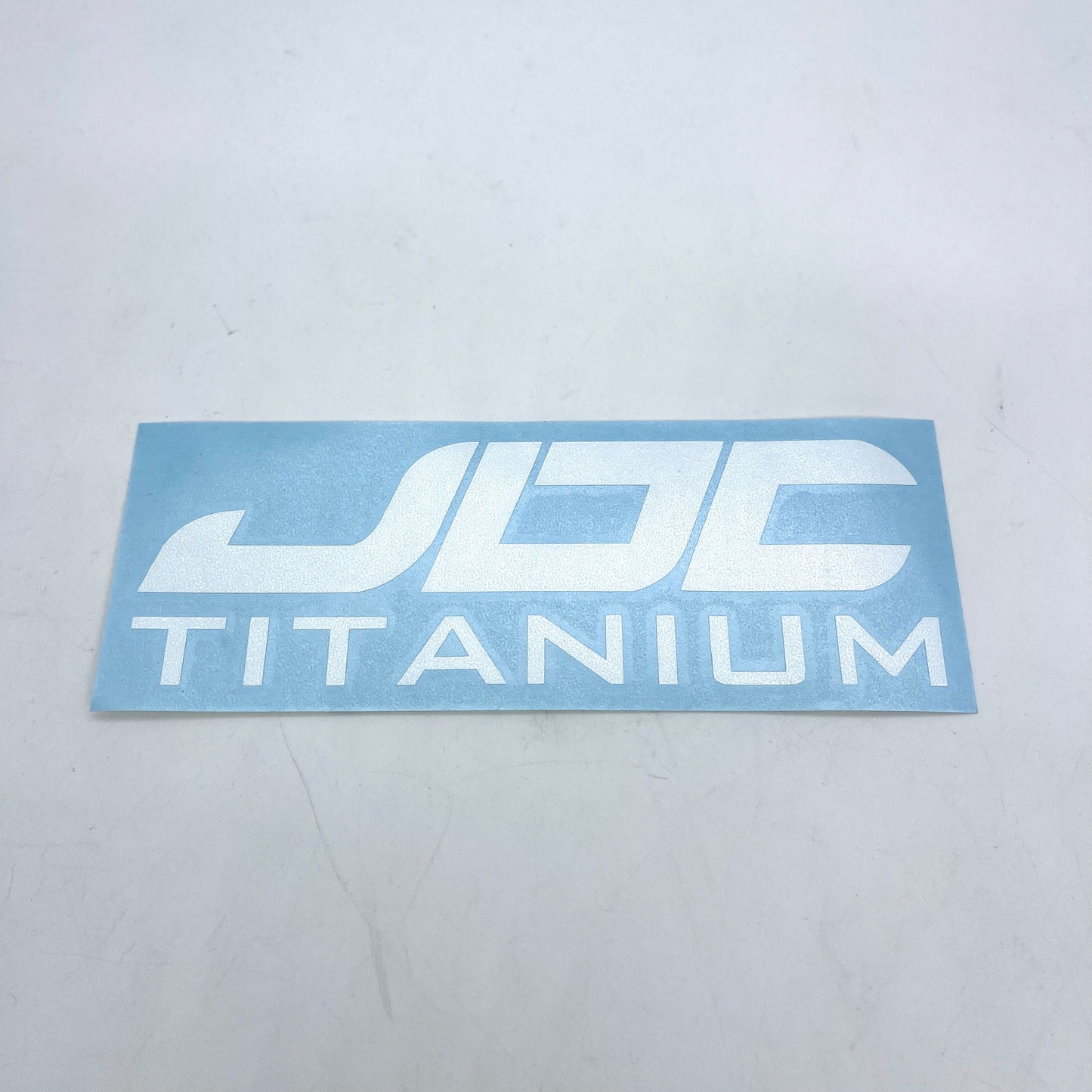 JDC Titanium Vinyl Logo