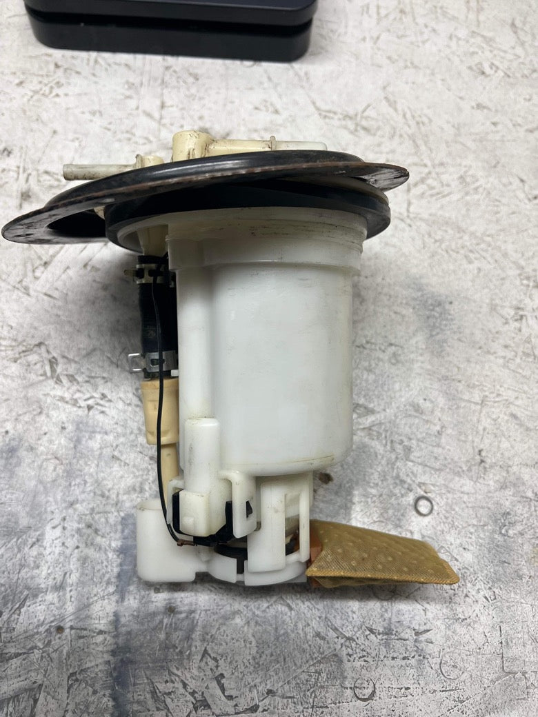 USED- Evo 9 fuel pump housing with Walbro 255