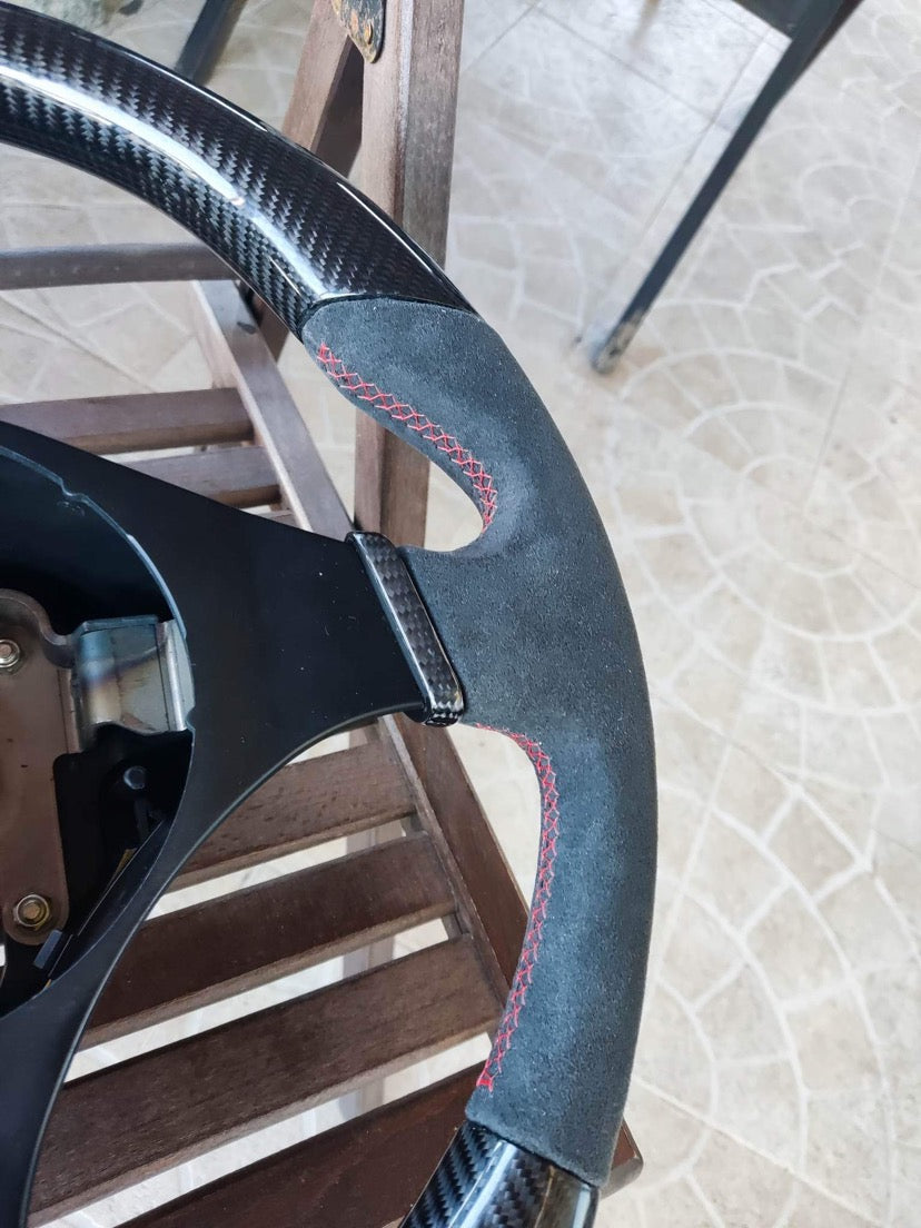 Gunmetal Momo retrimmed in Alcantara- No central ring