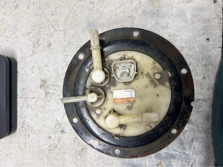 USED- Evo 9 fuel pump housing with Walbro 255