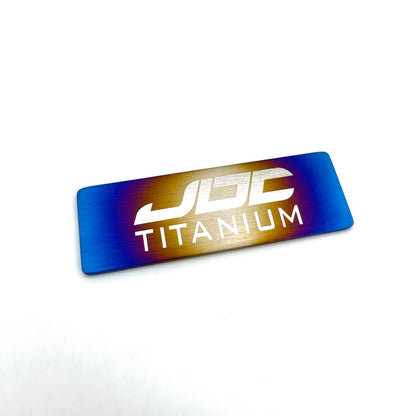 JDC Titanium Badge | 75mm x 25mm (Universal)