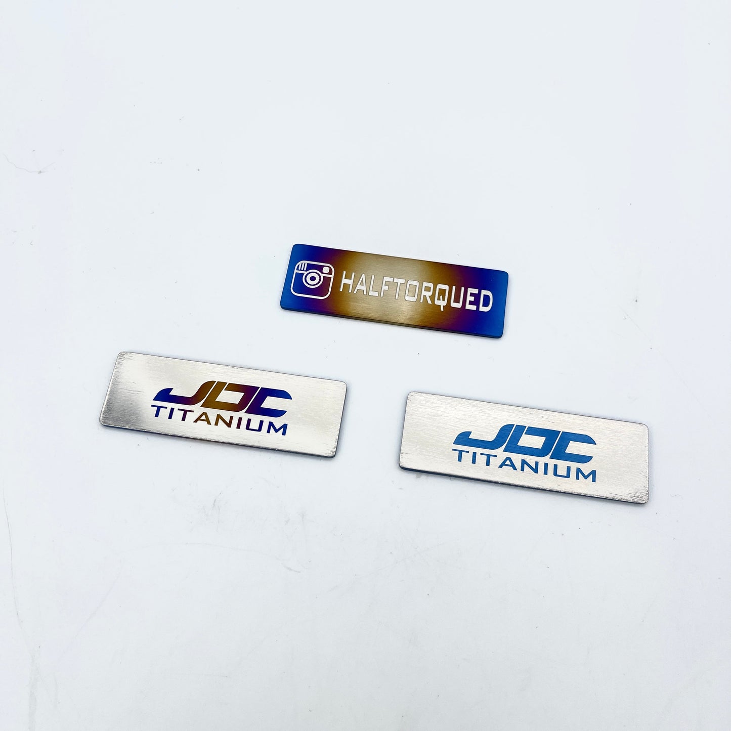 JDC Titanium Badge | 75mm x 25mm (Universal)